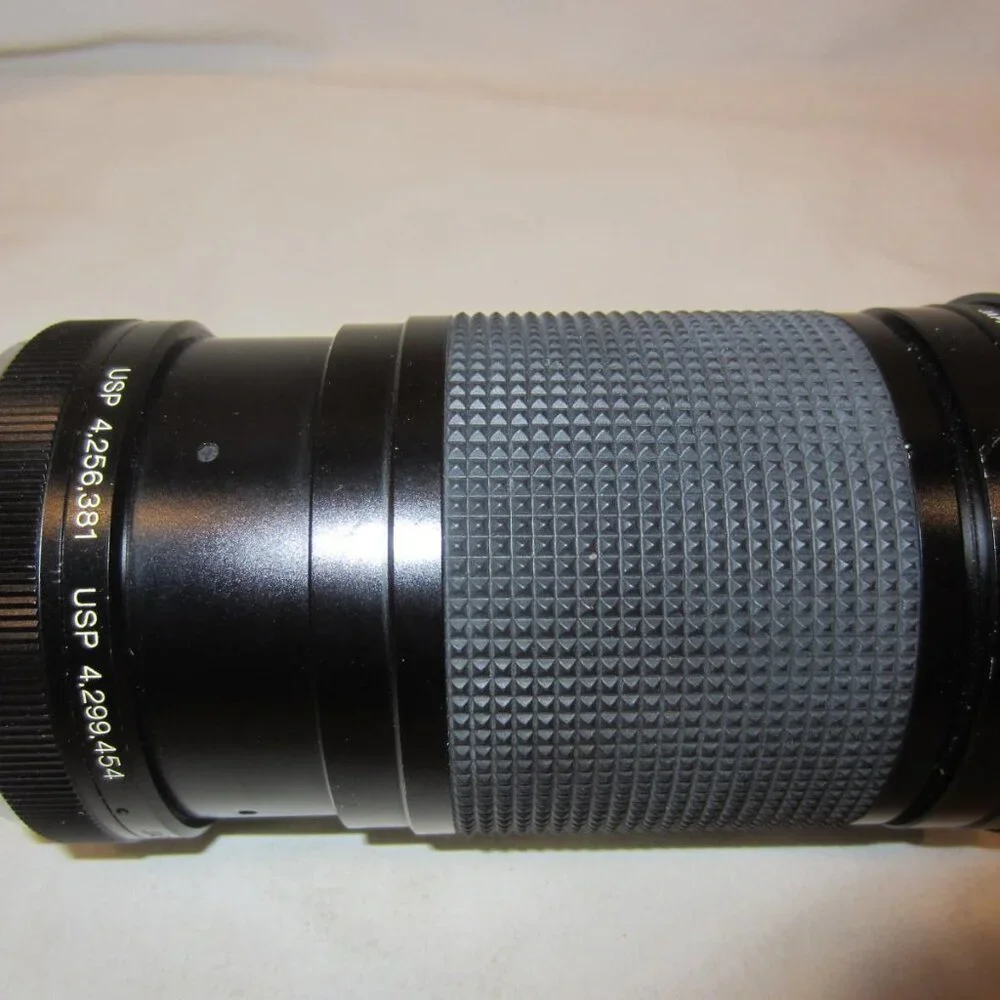 VIVITAR 28-85 mm macro zoom lens with Spectrum 7 filter